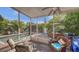 Beautiful screened-in patio overlooks the pool and outdoor living spaces, perfect for relaxing and entertaining at 2047 Roselawn St, Sarasota, FL 34231