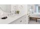 Stylish bathroom with modern fixtures and finishes at 310 Magnolia Ave, Anna Maria, FL 34216
