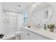 Modern bathroom with walk-in shower and stylish vanity at 310 Magnolia Ave, Anna Maria, FL 34216