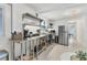 Bright kitchen with stainless steel appliances, subway tile backsplash, and plenty of counter space at 310 Magnolia Ave, Anna Maria, FL 34216