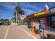A charming French ice cream shop with colorful decor and sidewalk seating, creating a delightful and inviting atmosphere at 310 Magnolia Ave, Anna Maria, FL 34216
