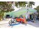 Eclectic shop featuring unique finds, surfboards, and a vintage car, creating a charming and memorable shopping experience at 310 Magnolia Ave, Anna Maria, FL 34216