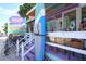 A quaint beach shop offering surfboards, rentals, and beach supplies, with a colorful facade and inviting storefront at 310 Magnolia Ave, Anna Maria, FL 34216