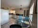 Bright kitchen featuring light cabinets, ample counter space, and tile floors for a functional and inviting cooking area at 3305 13Th W Ave, Bradenton, FL 34205