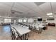 Community clubhouse has tables, chairs, and a television at 3528 Lake Bayshore Dr # K-115, Bradenton, FL 34205