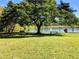 Expansive community park with benches, picnic tables, and a picturesque lake view for relaxing outdoor enjoyment at 3528 Lake Bayshore Dr # K-115, Bradenton, FL 34205