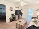 Living room with entertainment area and a sliding glass door to lanai at 3528 Lake Bayshore Dr # K-115, Bradenton, FL 34205
