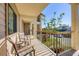 Relaxing outdoor balcony offers seating with neighborhood views at 3850 Mariners Walk # 713, Cortez, FL 34215