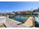 Community boat dock with canal access at 3850 Mariners Walk # 713, Cortez, FL 34215