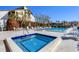 Enjoy the luxurious pool and jacuzzi area for relaxation and recreation at 3850 Mariners Walk # 713, Cortez, FL 34215
