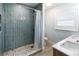Bathroom with beautiful tiled walk-in shower, and double sink vanity at 400 Dona Dr, Nokomis, FL 34275
