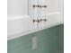Close up of the white cabinetry with modern clear pulls at 400 Dona Dr, Nokomis, FL 34275