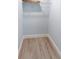 Walk-in closet with tile flooring and wire shelf at 400 Dona Dr, Nokomis, FL 34275
