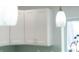 Bright kitchen featuring a pendant light over the sink at 400 Dona Dr, Nokomis, FL 34275