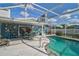 Backyard with a pool, screened-in patio, and garden at 45 Englewood Heights Rd, Englewood, FL 34223