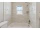 Clean bathroom with bathtub and shower at 5120 Beacon Rd, Palmetto, FL 34221