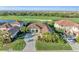 Luxury homes featuring paver driveways and meticulously maintained landscaping at 5529 Mulligan Way, Bradenton, FL 34211