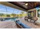 Relax and enjoy the outdoors on this screened patio with a pool and comfortable seating at 5529 Mulligan Way, Bradenton, FL 34211