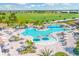 Aerial view of a resort-style pool and grounds, perfect for relaxing by the water and soaking in the sun at 5529 Mulligan Way, Bradenton, FL 34211