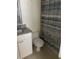 Clean bathroom with granite countertop and light tile flooring at 7211 W Country Club N Dr # 135, Sarasota, FL 34243