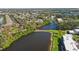Scenic aerial view of the waterway running through the community, surrounded by lush landscaping and providing a serene atmosphere at 805 Spring Lakes Blvd # 805, Bradenton, FL 34210