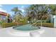Community hot tub surrounded by lush landscaping and offering a relaxing space for residents at 805 Spring Lakes Blvd # 805, Bradenton, FL 34210
