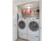 Convenient laundry area featuring side-by-side washer and dryer units at 805 Spring Lakes Blvd # 805, Bradenton, FL 34210