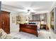 Inviting main bedroom with a ceiling fan, soft carpet, and warm natural light at 805 Spring Lakes Blvd # 805, Bradenton, FL 34210