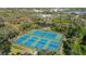 Aerial view of the community's six well-maintained pickleball courts, offering residents an active lifestyle and social opportunities at 805 Spring Lakes Blvd # 805, Bradenton, FL 34210
