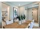 Bright dining room with a wooden table, seating for six, and modern decor at 8513 Golden Dawn Ct, Sarasota, FL 34241