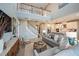 Spacious living room with high ceilings, stylish furniture and open floor plan at 8513 Golden Dawn Ct, Sarasota, FL 34241
