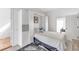 Cozy bedroom with a built-in Murphy bed and storage, great for guests at 8717 54Th E Ave, Bradenton, FL 34211
