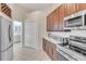 Well-equipped kitchen featuring stainless steel appliances and modern countertops at 8717 54Th E Ave, Bradenton, FL 34211
