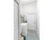 Efficient laundry area featuring tile flooring, modern appliances, and ample storage at 8717 54Th E Ave, Bradenton, FL 34211