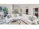 Bright living room showcasing neutral decor and large windows offering natural light and views at 8717 54Th E Ave, Bradenton, FL 34211