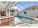 An inviting pool with a covered patio, perfect for relaxing or hosting gatherings at 8717 54Th E Ave, Bradenton, FL 34211