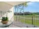 Relaxing lanai area with scenic golf course view at 8735 Olde Hickory Ave # 8210, Sarasota, FL 34238