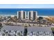 Aerial shot of beachfront high-rise condos with ample parking and easy beach access at 900 Gulf Blvd # 805, Indian Rocks Beach, FL 33785
