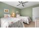 Bedroom featuring two twin beds, a ceiling fan, and a window with blinds at 9540 High Gate Dr # 1426, Sarasota, FL 34238