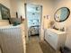 Bathroom showcases a well-lit vanity area and an open view to the Primary bedroom at 10315 Cortez W Rd # 12-3, Bradenton, FL 34210