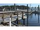 Community boat docks with sturdy wooden piers and access to the tranquil waters of the bay at 10315 Cortez W Rd # 12-3, Bradenton, FL 34210