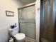 Shower area includes easy to reach shower head and a glass door at 10315 Cortez W Rd # 12-3, Bradenton, FL 34210