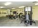 Well-equipped gym with multiple machines, weights, and space for a full workout at 104 Inlets Blvd # 104, Nokomis, FL 34275