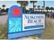 The sign for Nokomis Beach, which is a Sarasota County Parks & Recreation Department facility at 104 Inlets Blvd # 104, Nokomis, FL 34275