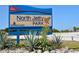 Entrance sign to North Jetty Park in Sarasota County, showcasing the park's natural beauty at 104 Inlets Blvd # 104, Nokomis, FL 34275