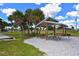 Outdoor picnic area with tables and shelters, ideal for Gathering gatherings and community events at 104 Inlets Blvd # 104, Nokomis, FL 34275