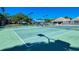 Well-maintained tennis courts providing a great recreational amenity at 104 Inlets Blvd # 104, Nokomis, FL 34275