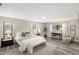 Bright main bedroom featuring neutral decor, ample natural light, and a comfortable layout at 124 Mark Twain Ln, Rotonda West, FL 33947