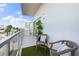 Relaxing balcony seating area with a view at 1335 2Nd St # 402, Sarasota, FL 34236