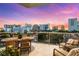 Spacious balcony with seating offers breathtaking city skyline views, perfect for outdoor relaxation at 1335 2Nd St # 402, Sarasota, FL 34236